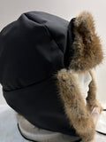 Chapeau en tissu coupe-vent et lapin